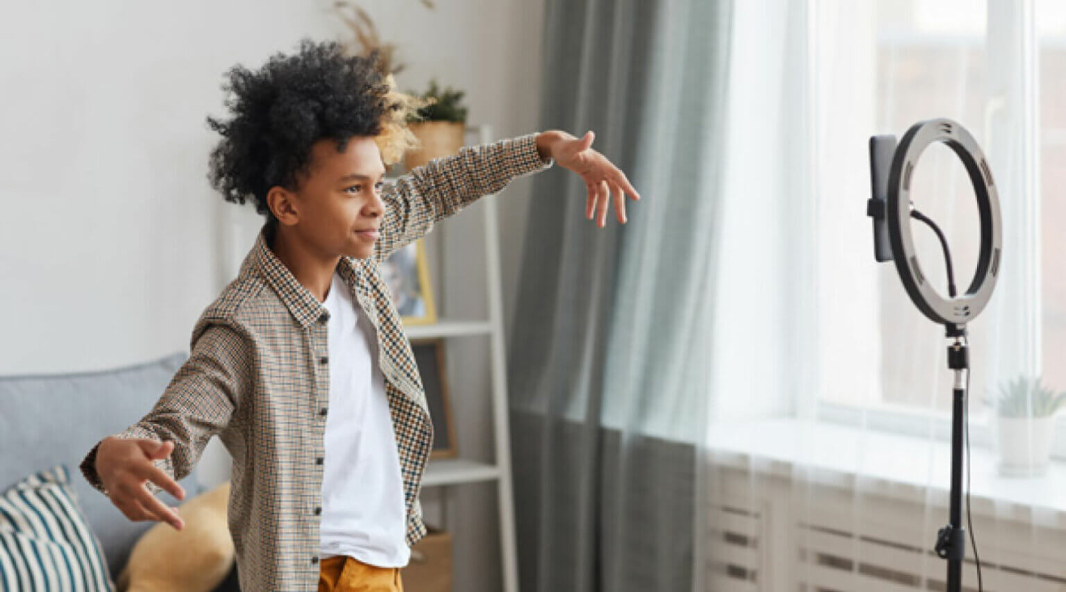 Boy posing in front of phone camera